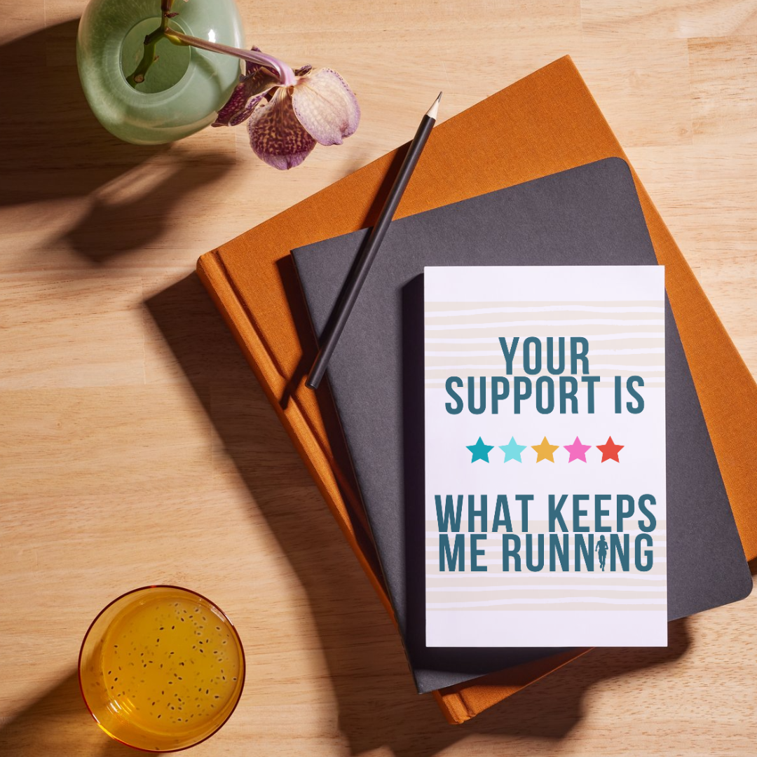 A greeting card that says "Your Support Is What Keeps Me Running."